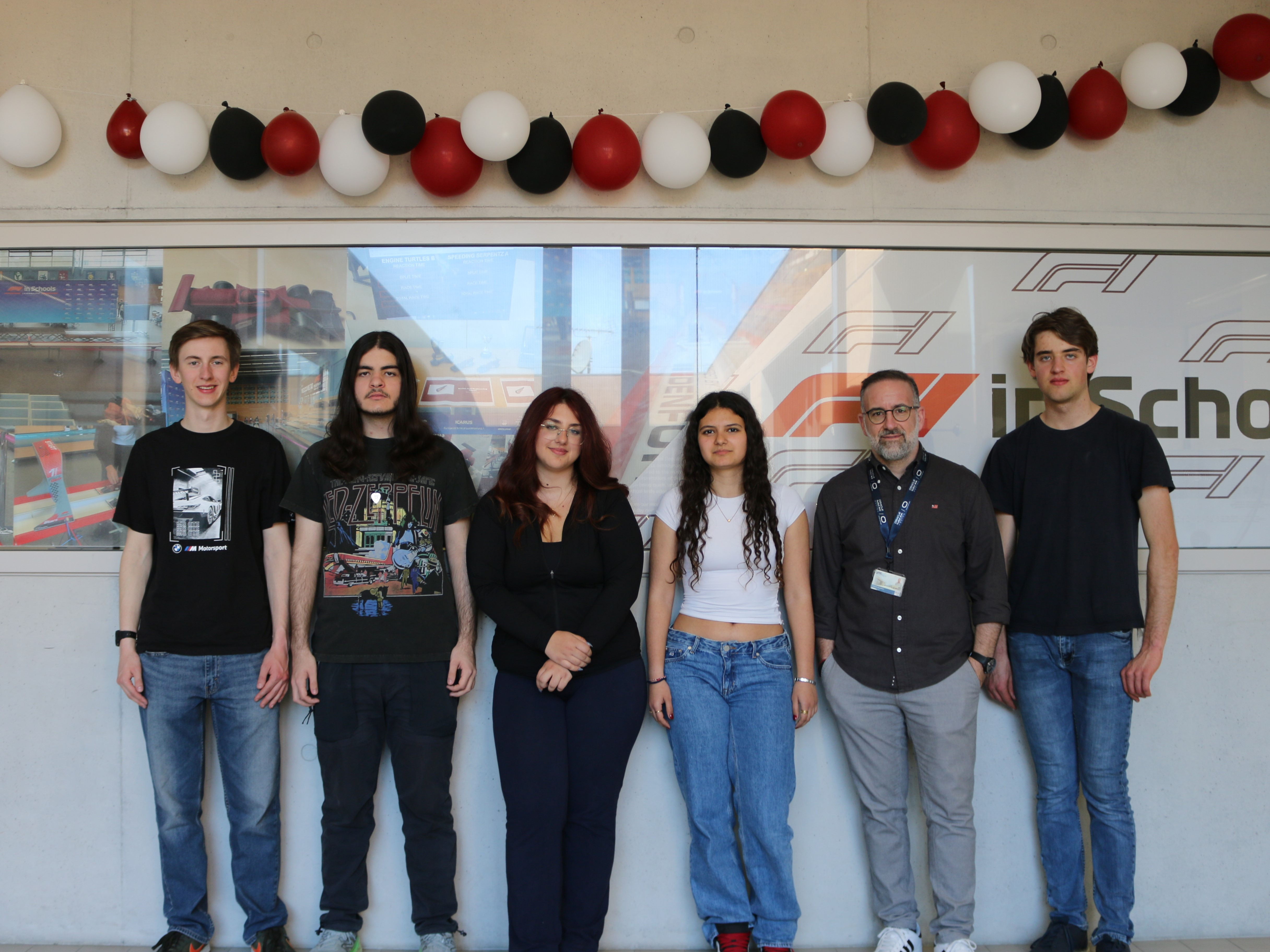Team photo next to our workspace